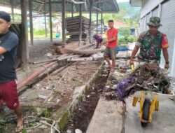 Koramil 1418 02/Tapalang & Pedagang Gelar Karya Bakti Pasar Taan